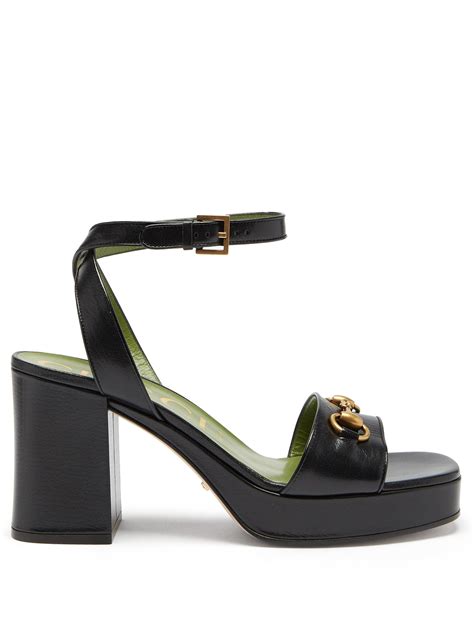 Women's Horsebit platform sandal in black leather .